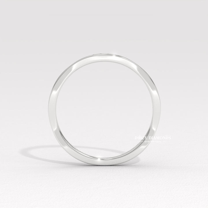 Side view of round diamond wedding band