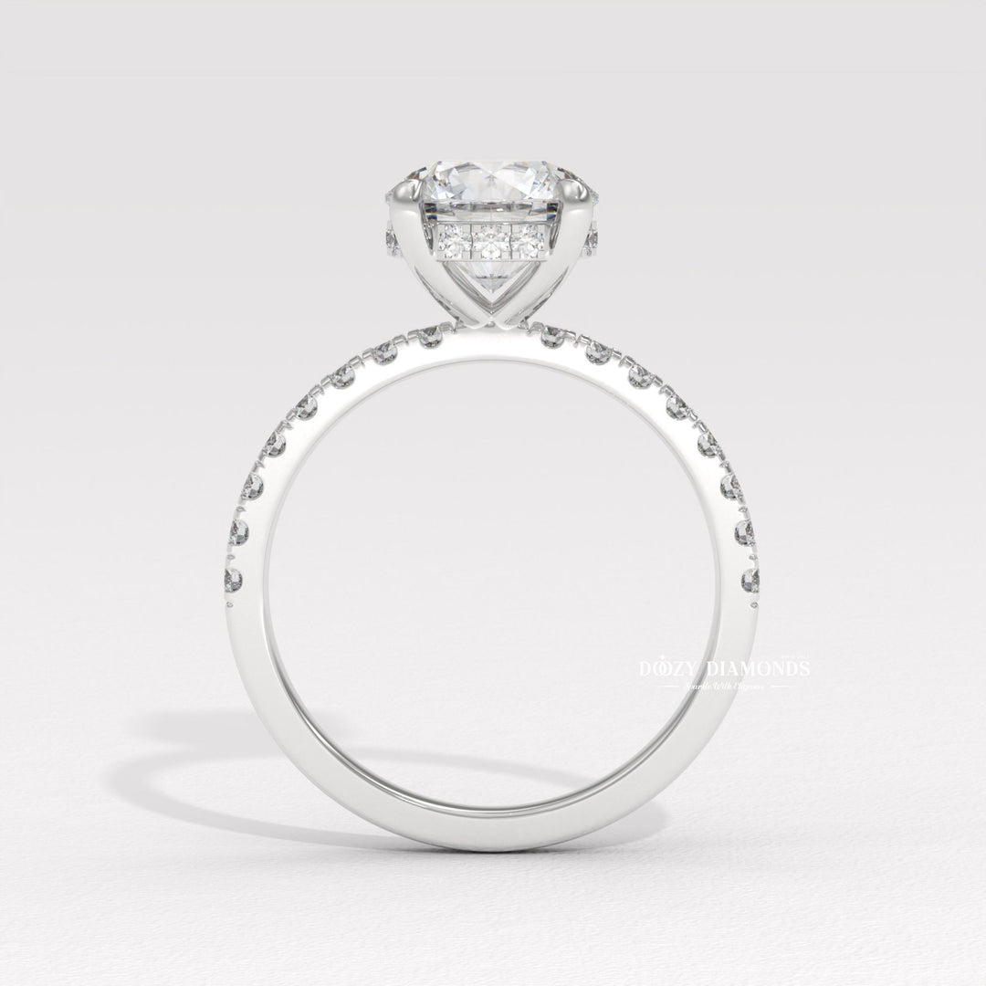 Detailed close-up of round hidden halo diamond engagement ring