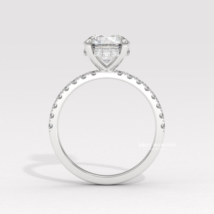 Detailed close-up of round hidden halo diamond engagement ring