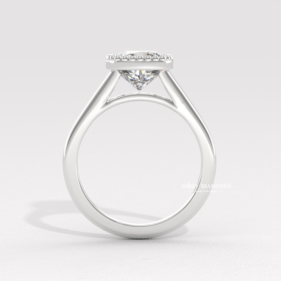 Premium cushion cut bezel engagement ring crafted in solid gold