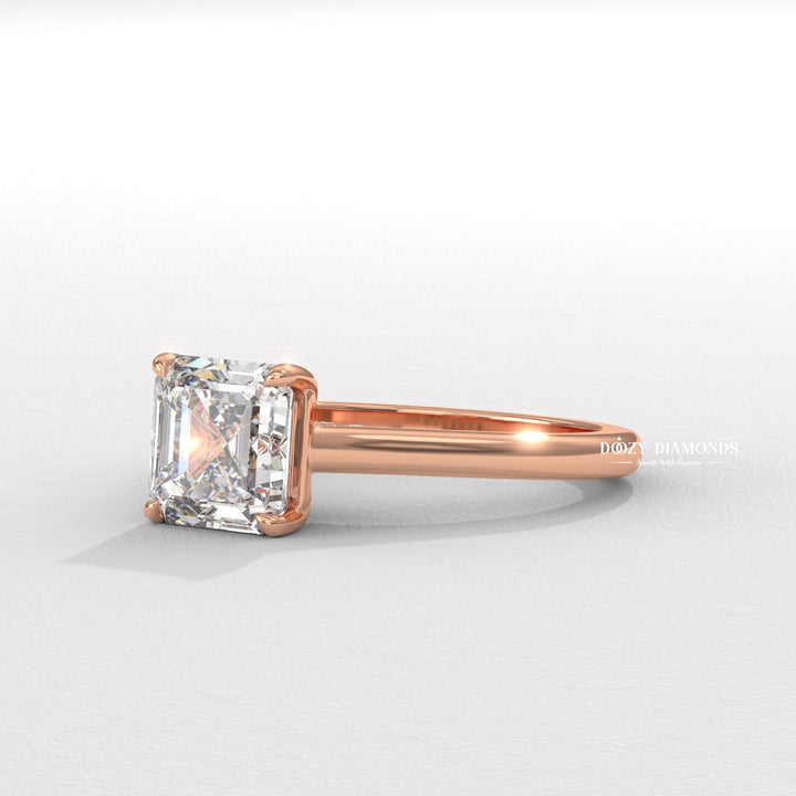 Certified asscher cut diamond featured in solitaire engagement ring