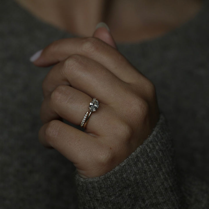 Side angle of oval solitaire diamond engagement ring