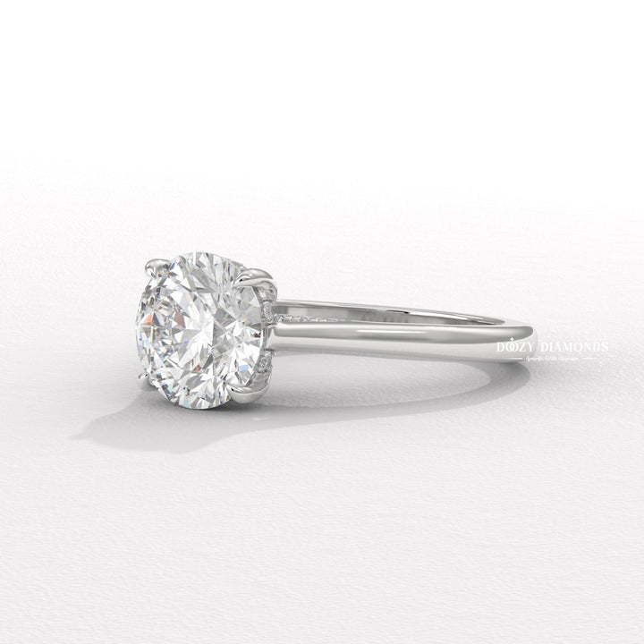 Side angle of round hidden halo diamond engagement ring