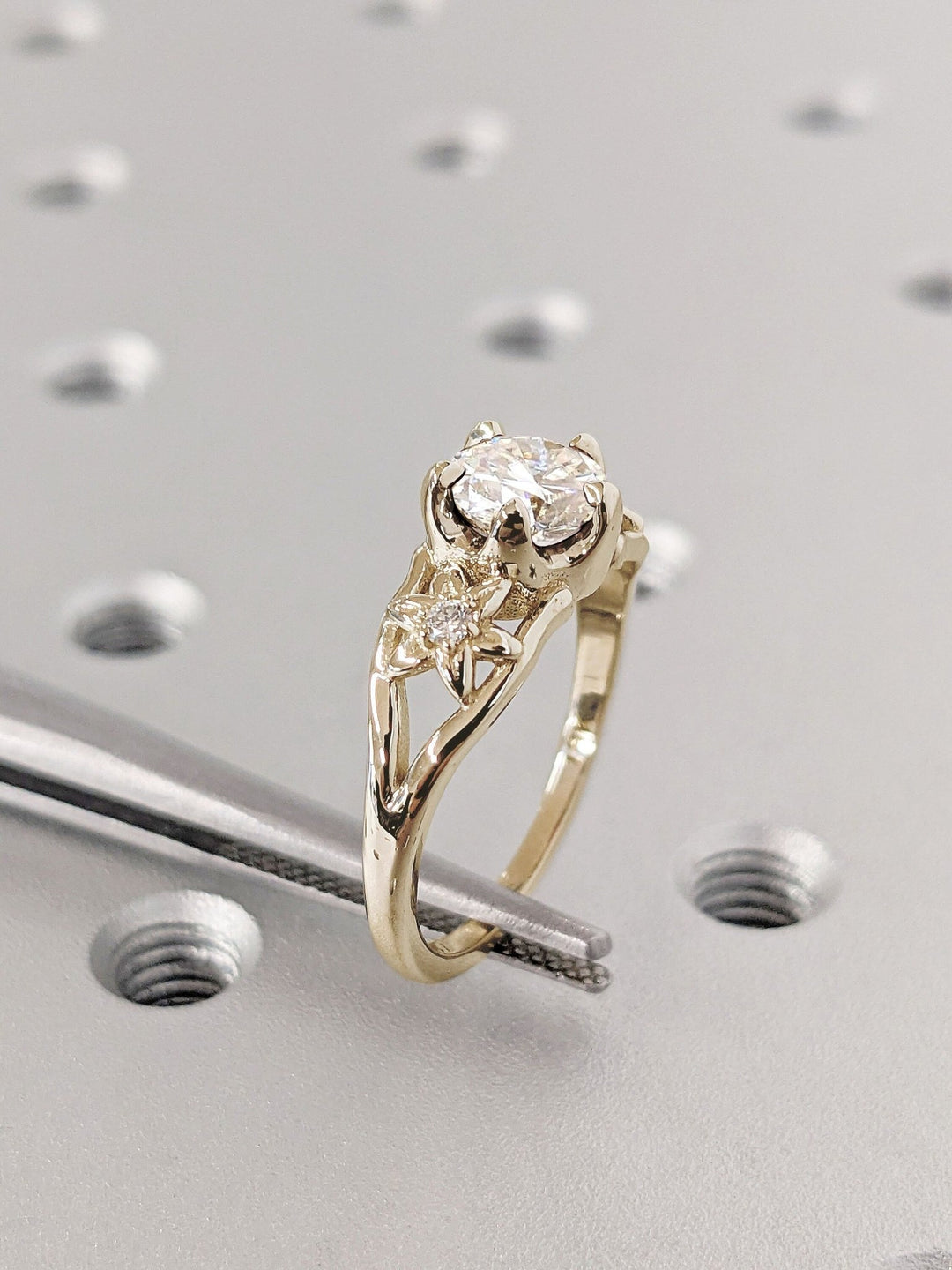 Round solitaire engagement ring with IGI certificate and packaging