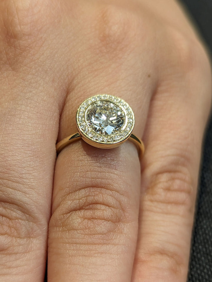 Handcrafted round cut solitaire lab grown diamond engagement ring
