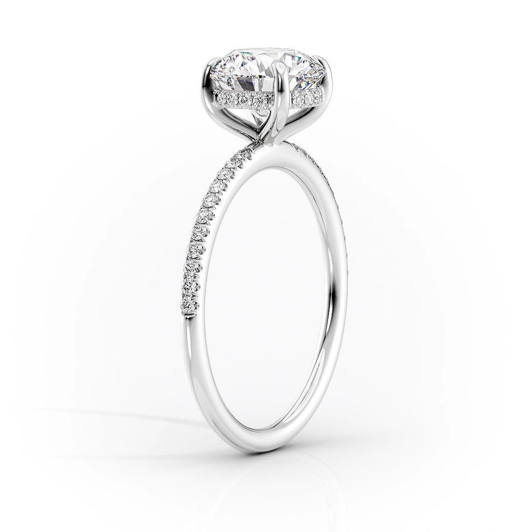 Detailed close-up of oval hidden halo diamond engagement ring