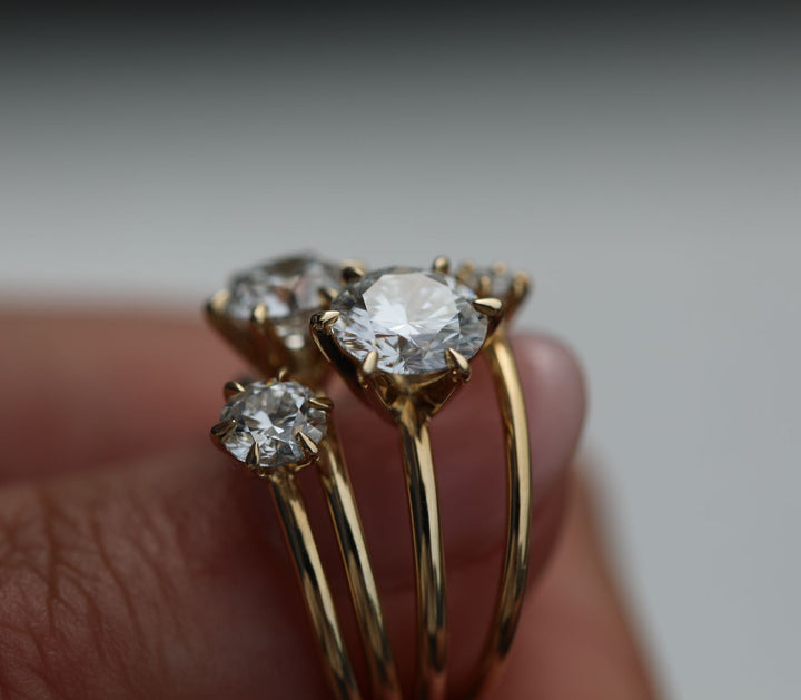 Close-up of round cut center diamond in solitaire engagement ring