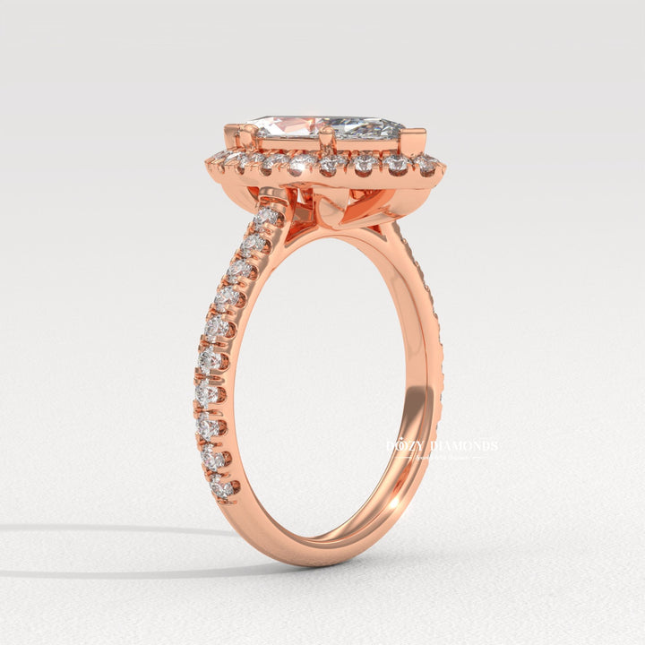 Marquise solitaire diamond ring displayed on jewelry stand