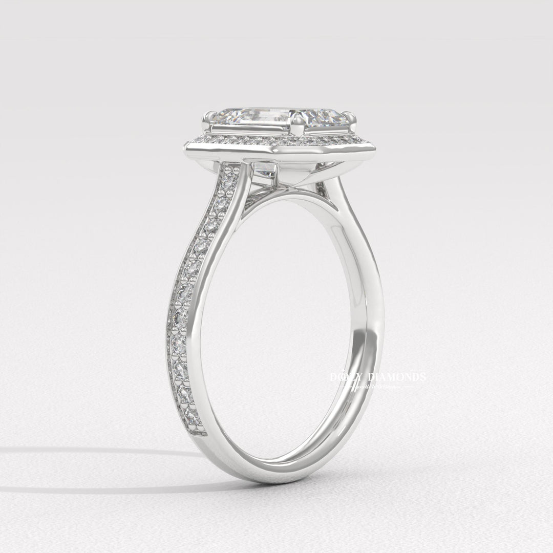 Side angle of emerald halo diamond engagement ring