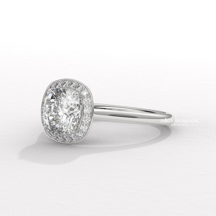 Unboxing view of cushion cut halo diamond engagement ring