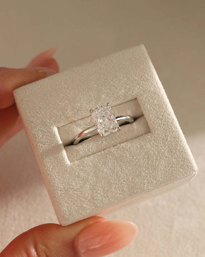simple solitaire setting, clean solitaire mounting, refined diamond setting, statement solitaire setting, radiant center setting, prong head setting, basket head setting, minimal head setting, high polish setting, low basket mounting, secure basket mounting, elegant basket setting,