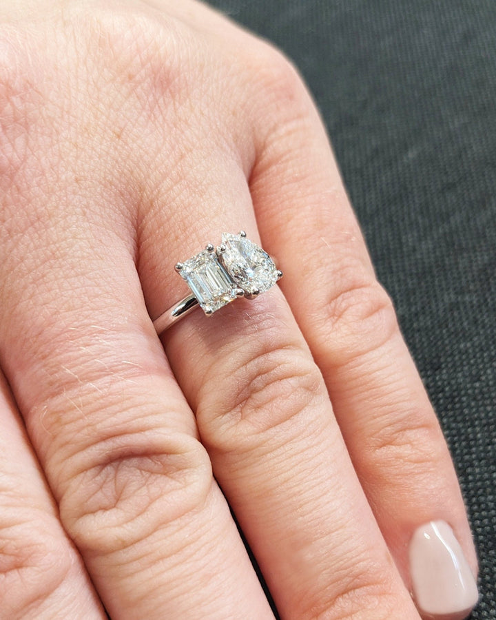 Pear solitaire engagement ring close-up highlighting diamond sparkle