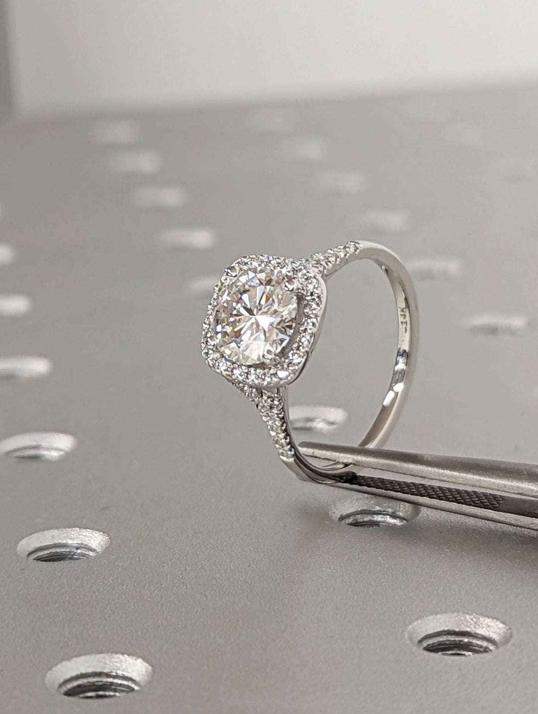 Round pave diamond ring presented in signature gift packaging