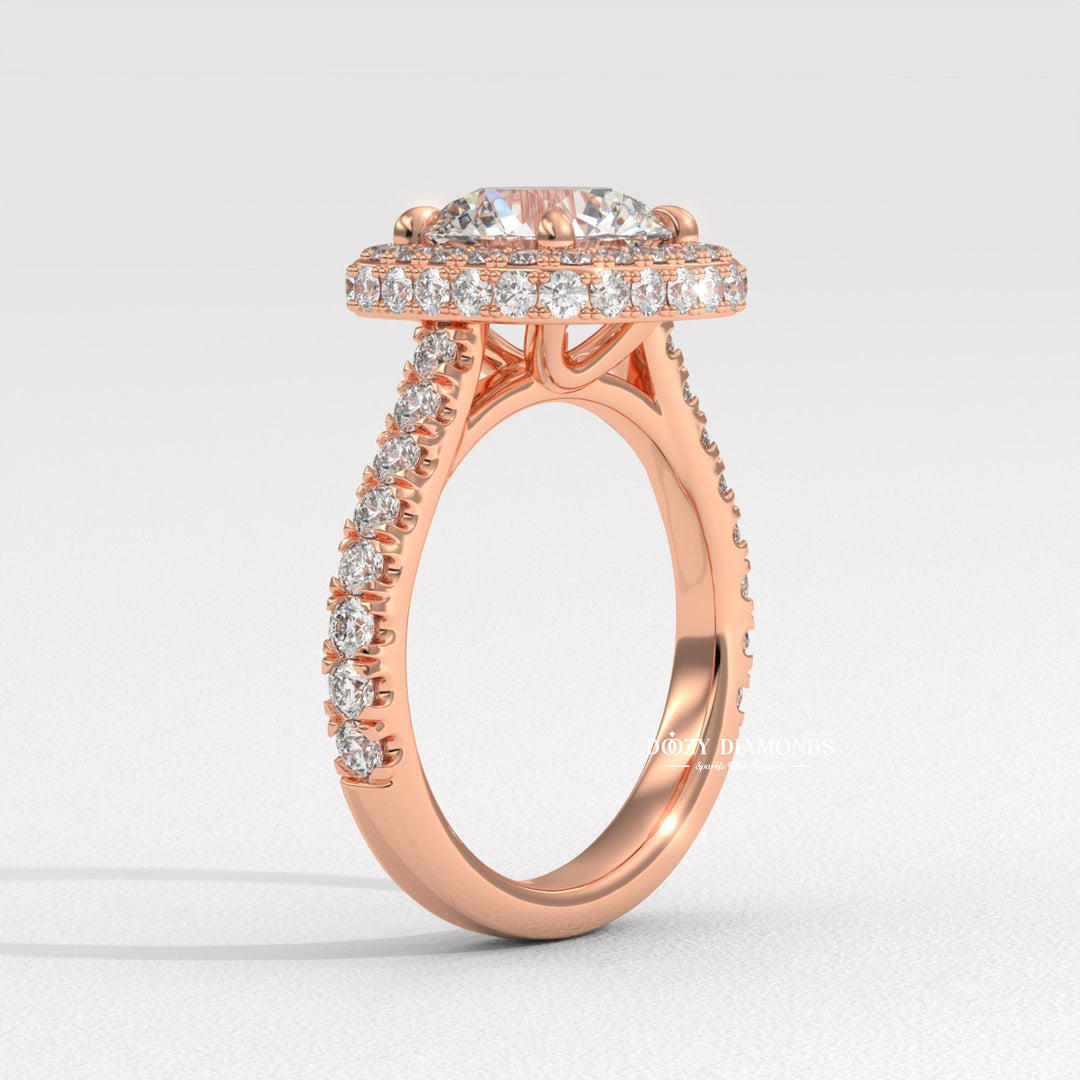 Round halo lab grown diamond ring fitted on finger