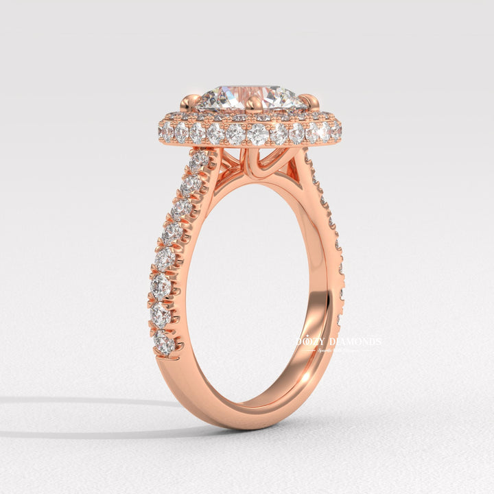 Round halo lab grown diamond ring fitted on finger