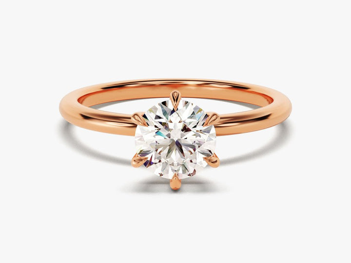 Unboxing view of round cut solitaire diamond engagement ring