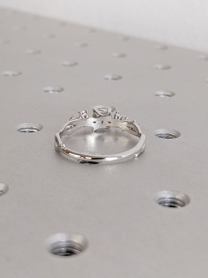 Lifestyle shot of round cluster diamond ring on hand