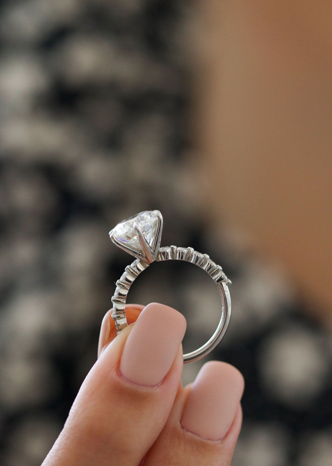 Round pave engagement ring offered in gold and platinum