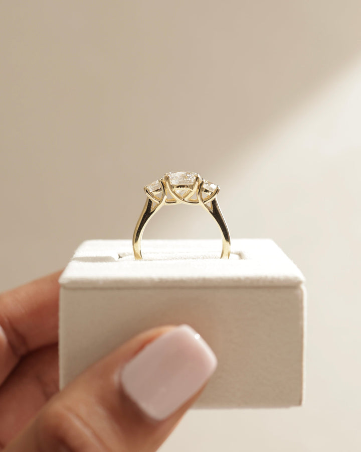 minimal row setting, clean row mounting, contemporary row mounting, fine jewelry mounting, designer three stone setting, high end setting, premium stone setting, secure diamond mounting, polished prong mounting, refined engagement mounting, modern engagement mounting, classic engagement mounting, architectural mounting, elegant mounting style,
