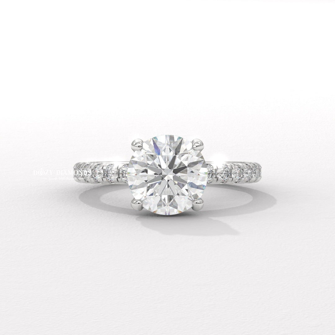 Round hidden halo diamond ring displayed on jewelry stand