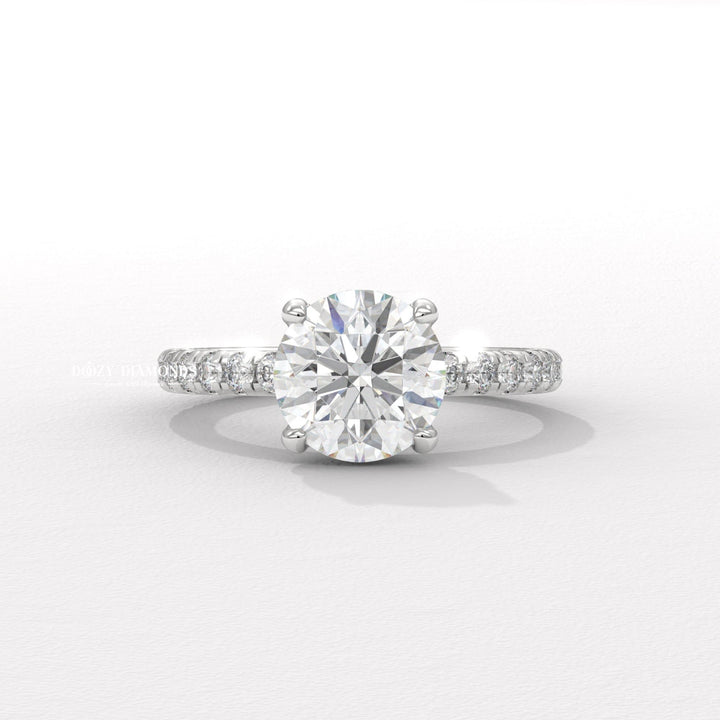 Round hidden halo diamond ring displayed on jewelry stand