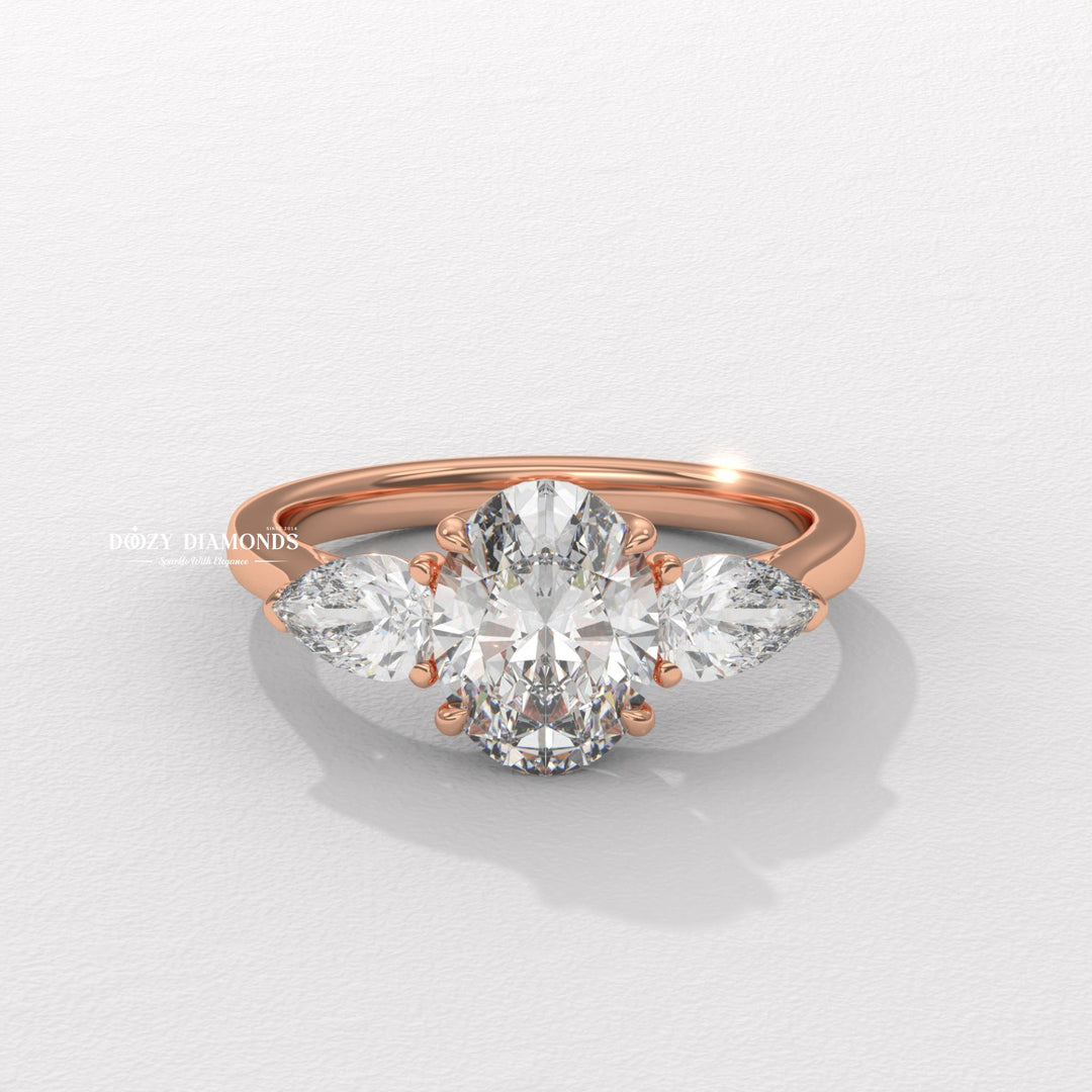 Oval three stone engagement ring viewed from the side