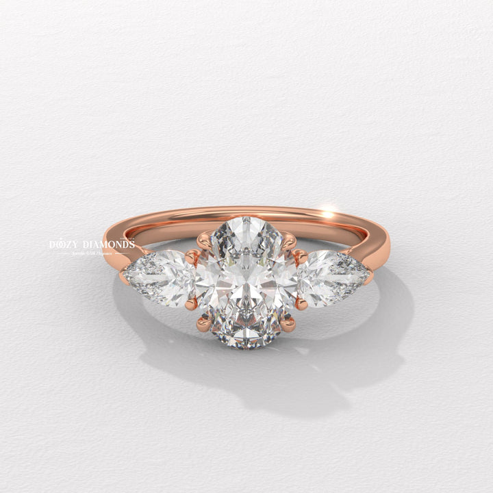 Oval three stone engagement ring viewed from the side