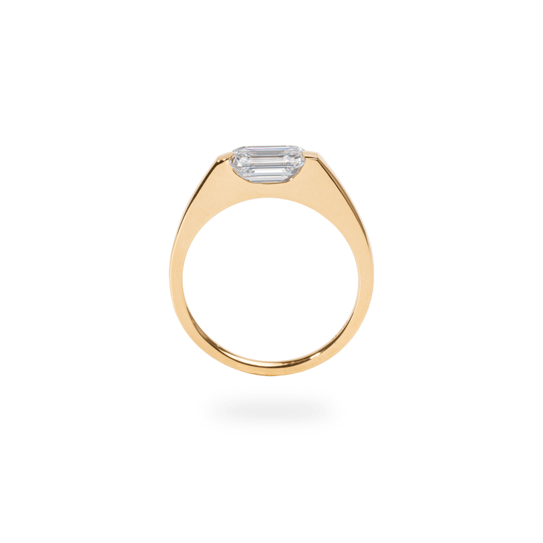 Emerald east west diamond engagement ring available in multiple metals