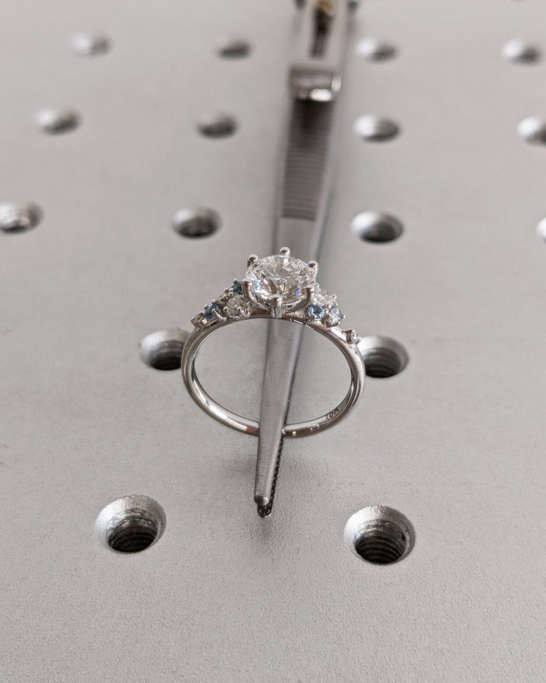 Round cut engagement ring side view showing band detail