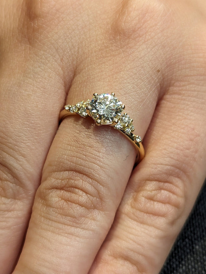 Premium round cut cluster engagement ring crafted in solid gold