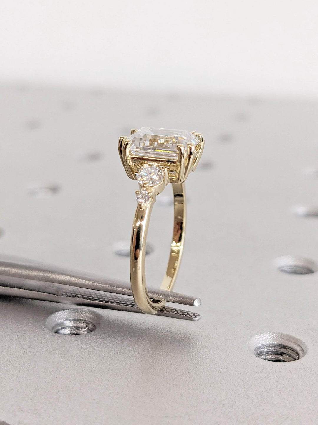 Classic emerald cluster engagement ring crafted for everyday wear