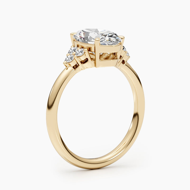 Macro shot of oval cut diamond facets in cluster ring setting