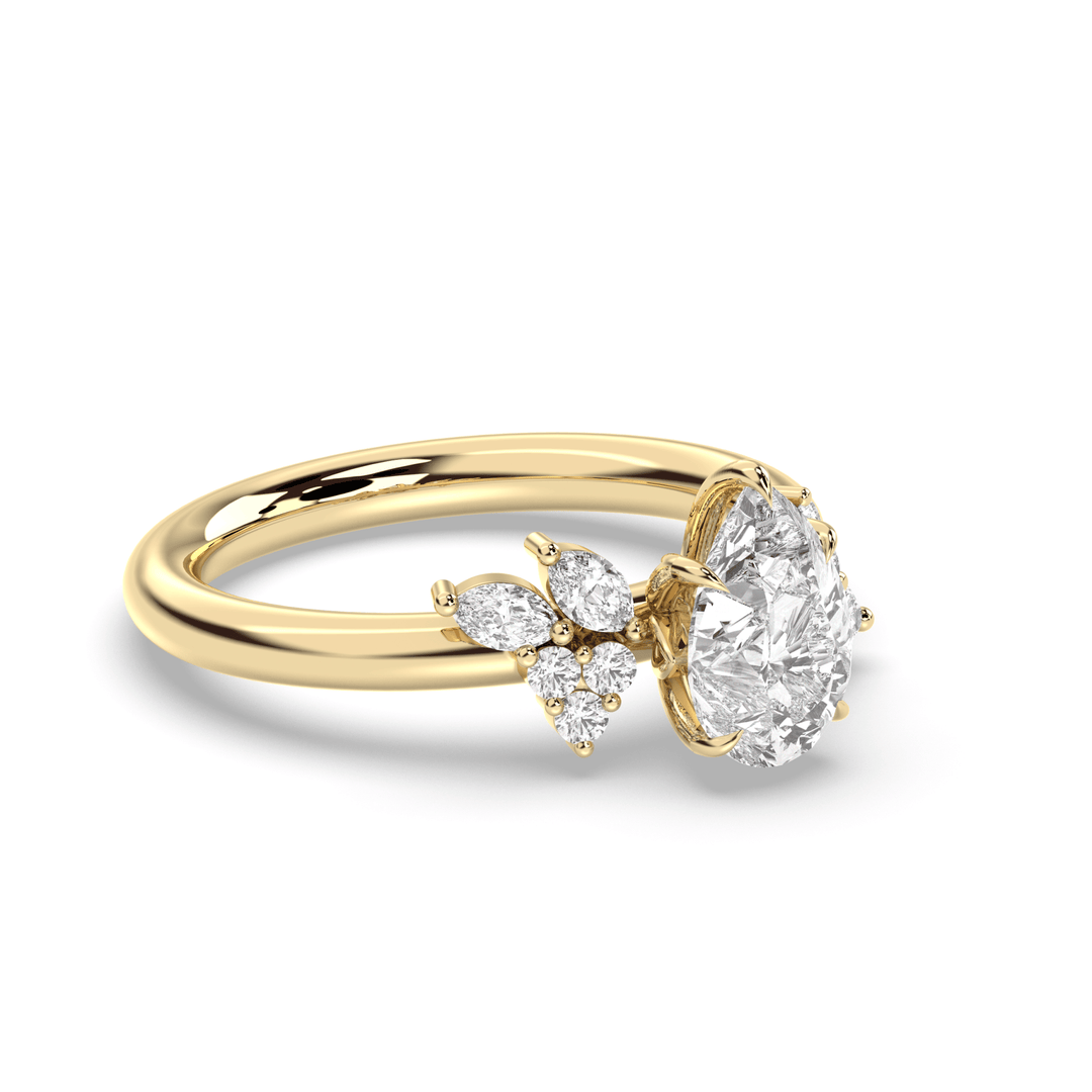 Unboxing view of pear cut cluster diamond engagement ring