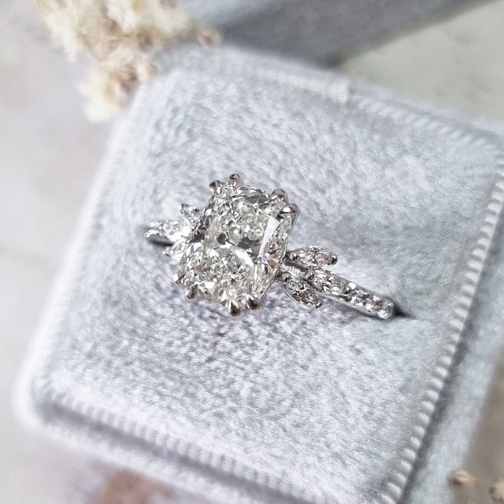 Side angle of cushion cluster diamond engagement ring