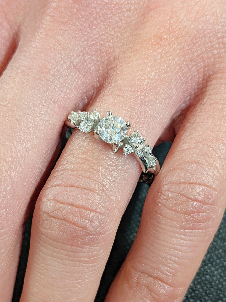 Round cluster engagement ring with certified lab grown diamond