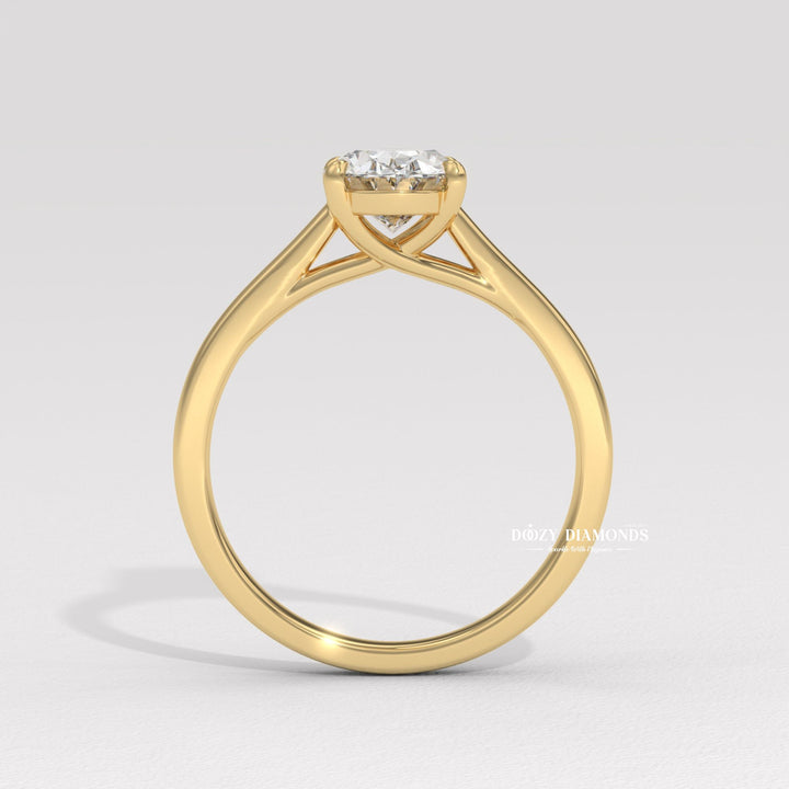 Fine craftsmanship detail on oval solitaire engagement ring