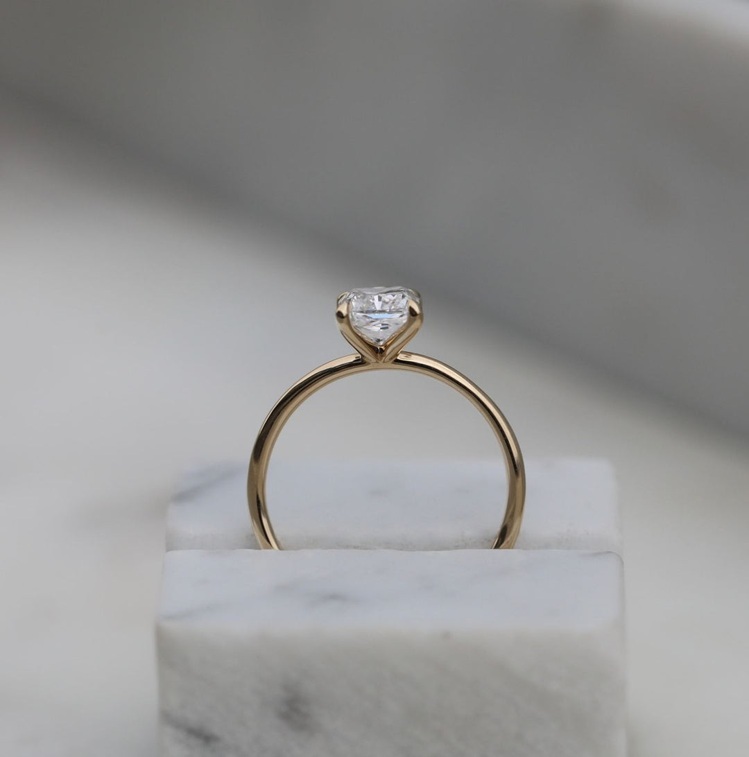 Fine craftsmanship detail on radiant solitaire engagement ring