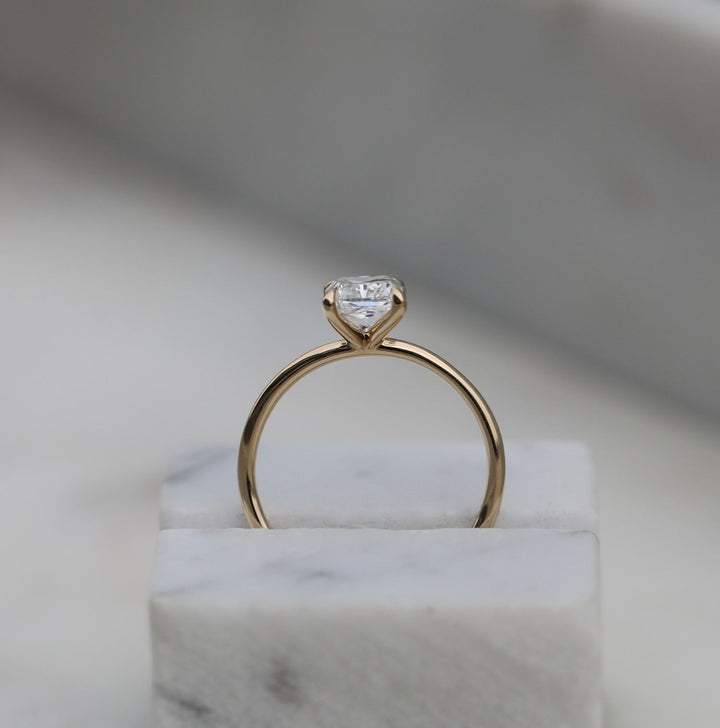 Fine craftsmanship detail on radiant solitaire engagement ring