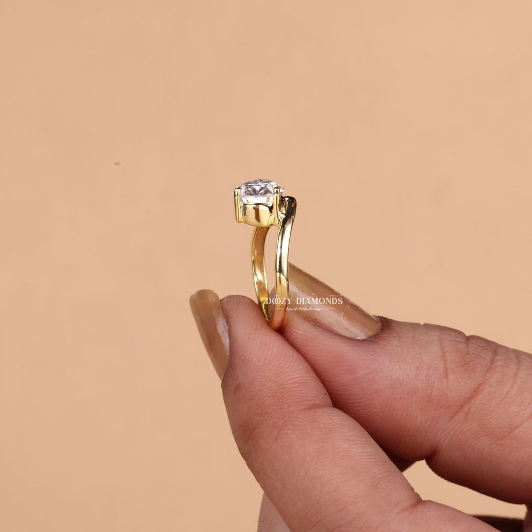 IGI certified pear cut diamond in dome engagement ring setting
