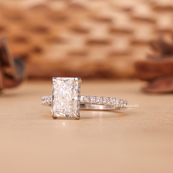 Radiant cut engagement ring side view showing band detail