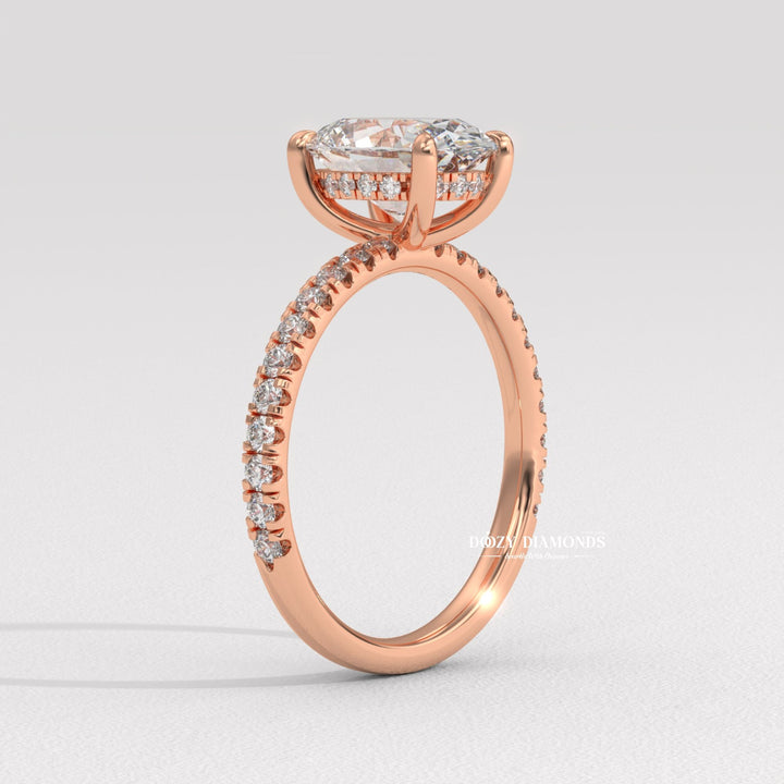 Unboxing view of oval cut hidden halo diamond engagement ring