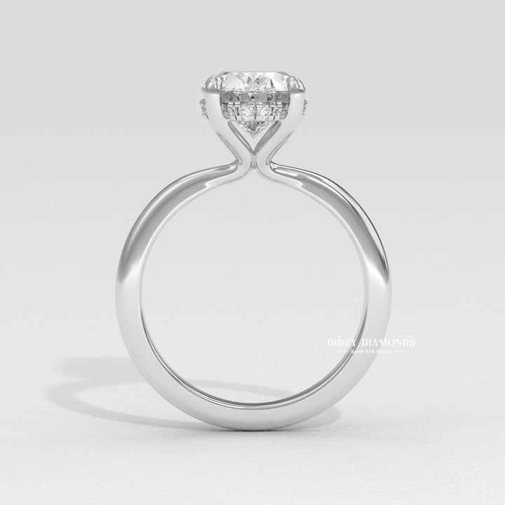 Oval cut solitaire engagement ring with IGI certified center diamond