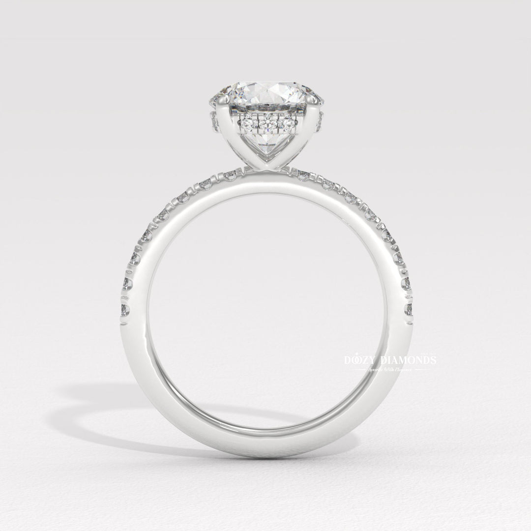 Round pave engagement ring offered in gold and platinum
