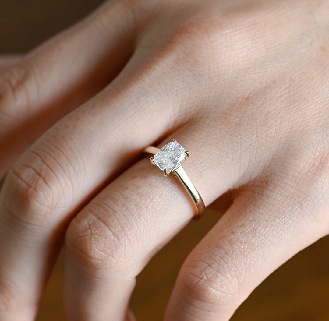 Cushion cut hidden halo engagement ring with IGI certified center diamond