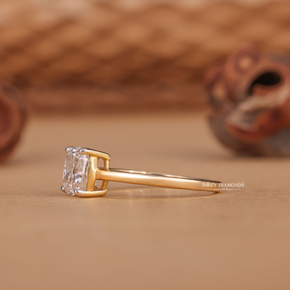 Cushion solitaire diamond ring presented in signature gift packaging