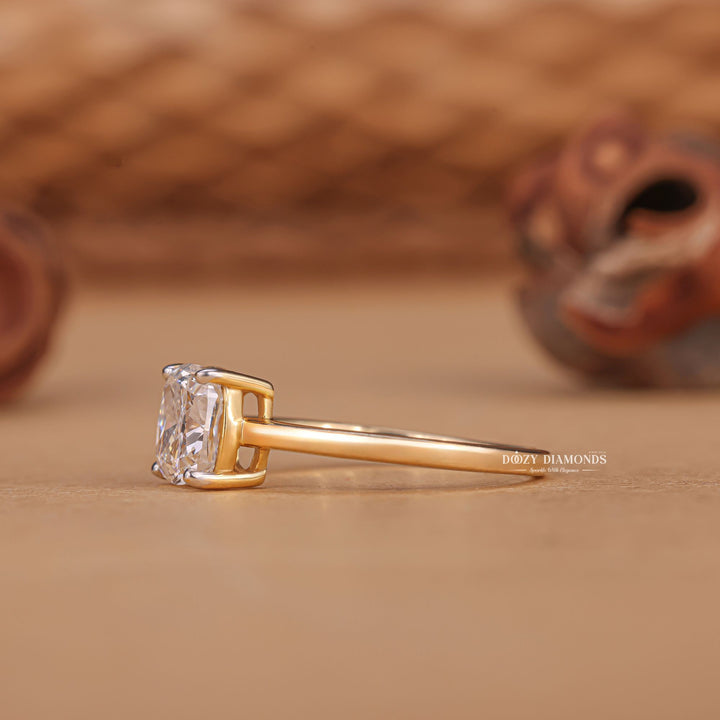 Cushion solitaire diamond ring presented in signature gift packaging