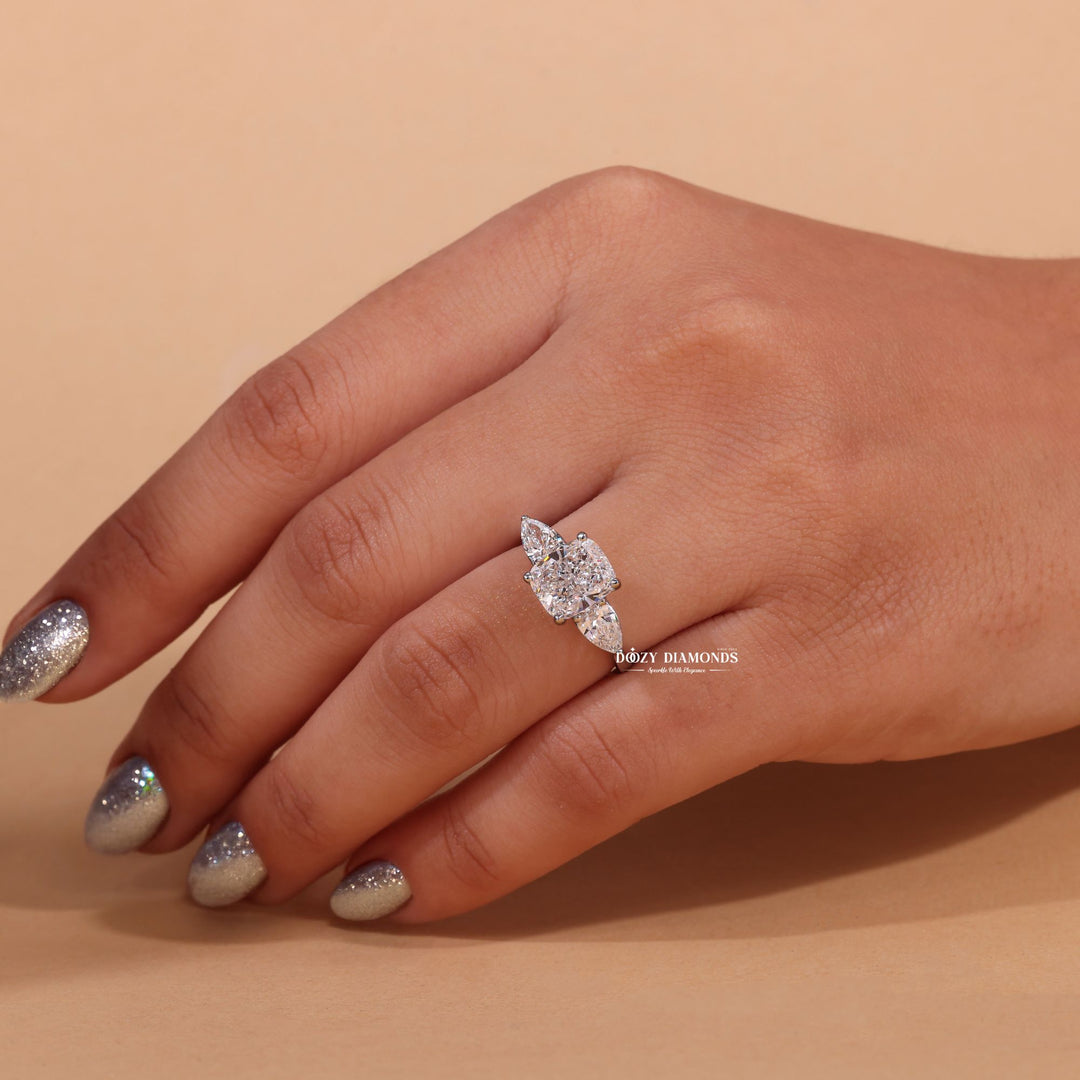 Cushion cut diamond ring worn on hand