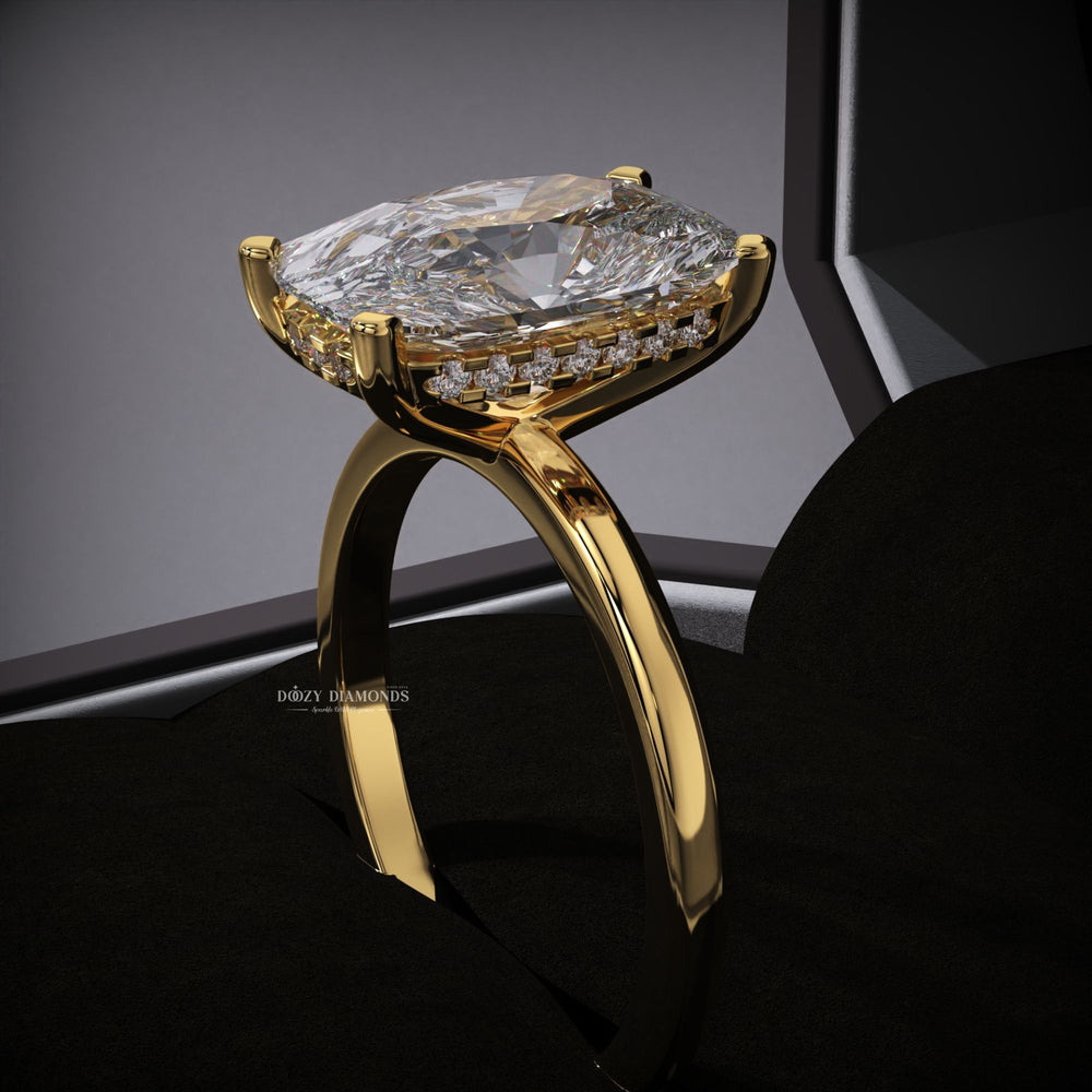 Cushion hidden halo diamond ring presented in signature gift packaging