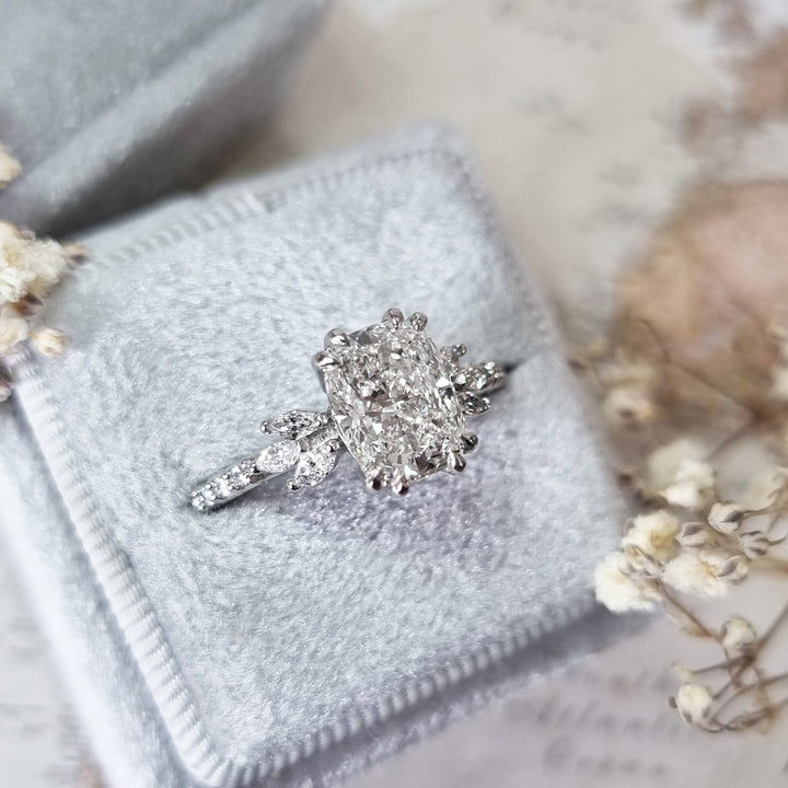 Profile view of cushion cut cluster engagement ring band