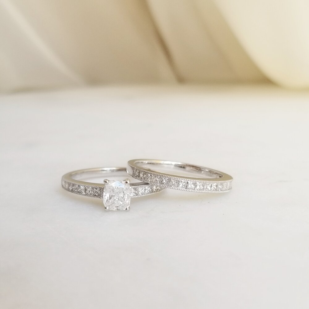 Cushion solitaire diamond ring presented in signature gift packaging